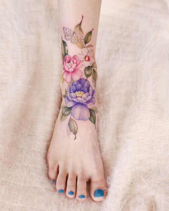 Transformative Elegance: Silo’s Exquisite Flower Tattoos And Expert Cover-UPS