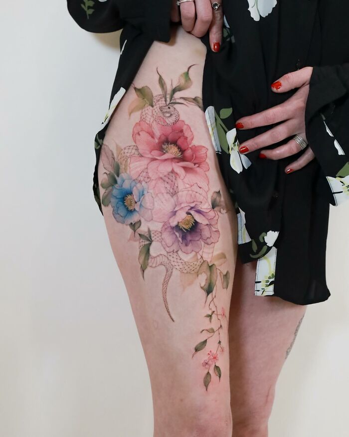 Transformative Elegance: Silo’s Exquisite Flower Tattoos And Expert Cover-UPS