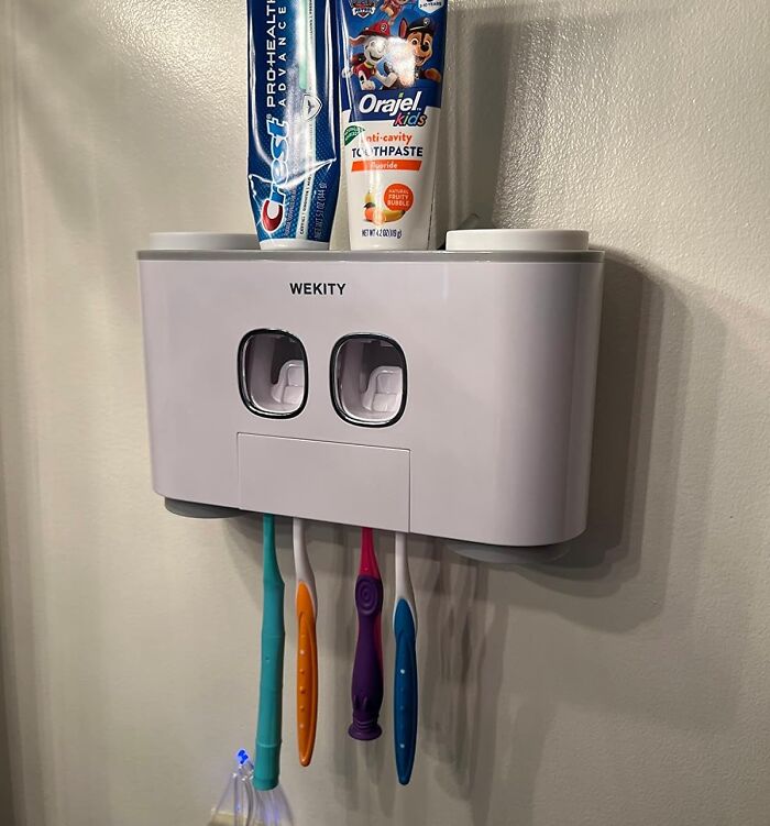 This Toothbrush Holder Wall Mounted Doubles As A Toothpaste Dispenser. Pure Genius! 