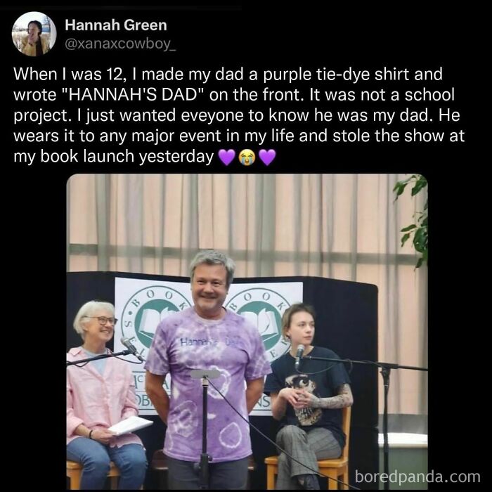 Man in purple tie-dye shirt labeled "Hannah's Dad" at a book launch, capturing millennial life humor.