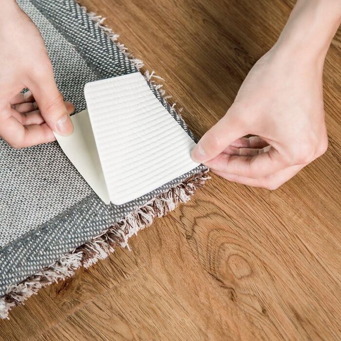 Tired Of Tripping Over Your Rugs? Rug Gripper Stickers Will Keep Them In Place!