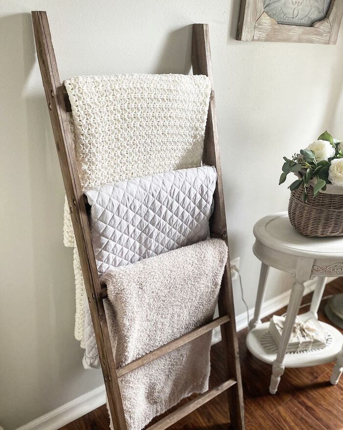 A Rustic Blanket Ladder Will Help You Reach The Top Of Your Organizational Game