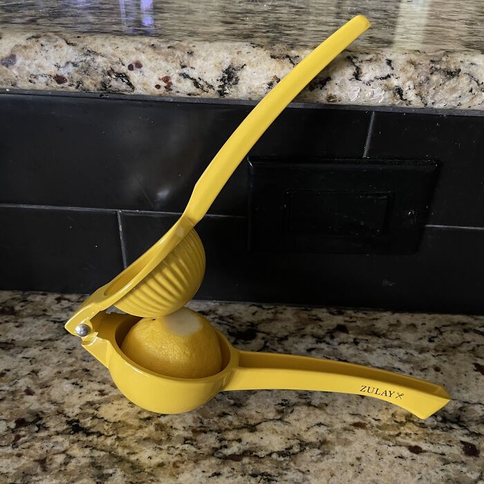This Metal Lemon Squeezer Will Get Every Last Drop Out Of Your Citruses
