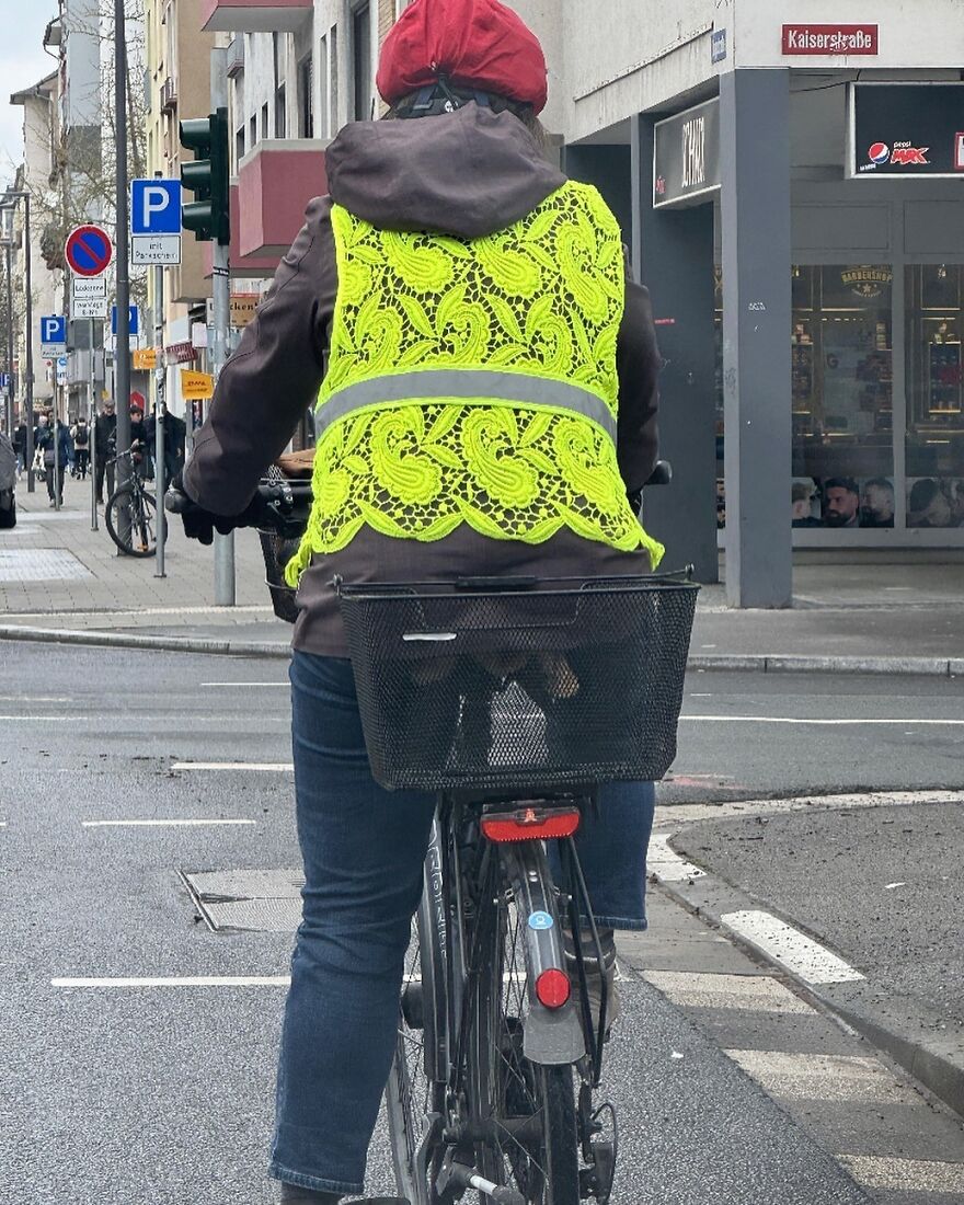 This Person Is Wearing A Crochet Laced Safety Vest