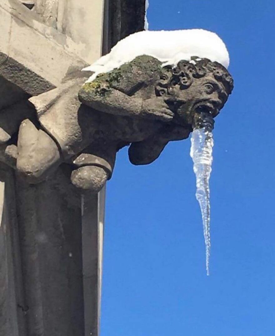 An Icicle Coming Out This Gargoyles Mouth