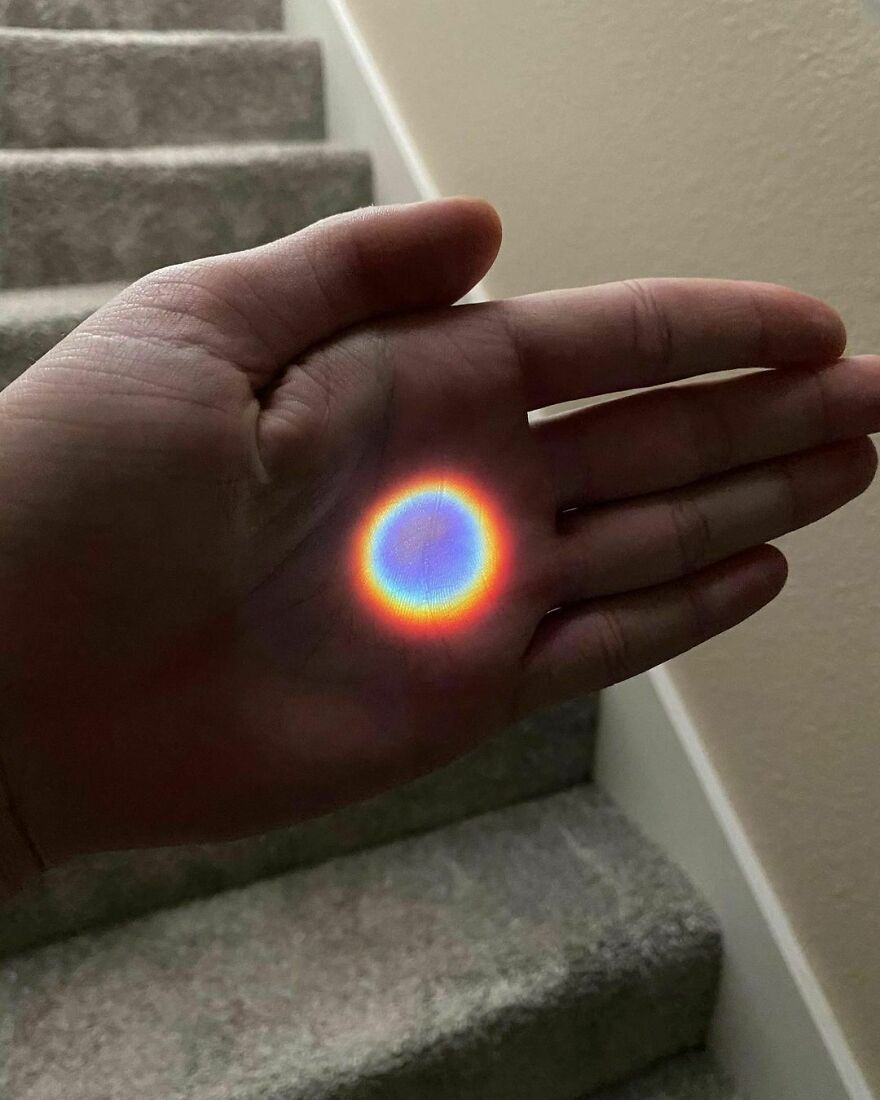 Sunlight Can Create Rainbow Light Refractions Through Tiny Openings Of Reflection