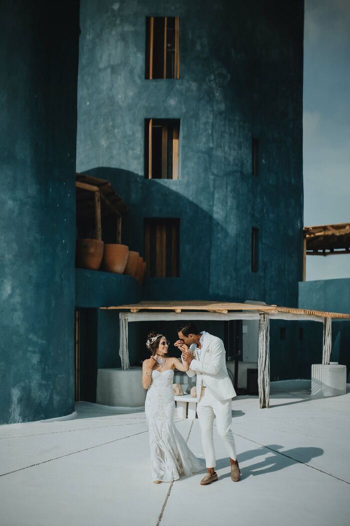 Couple in elegant wedding attire at a picturesque destination, captured in 2024's best wedding photos.