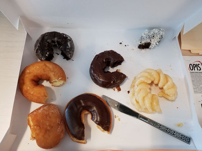 This Is Donut Anarchy: My Friend's Coworker Cut A Piece Out Of Every Donut In The Box