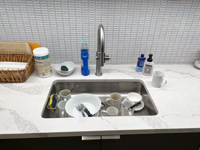 No One Puts The Dishes Away In The Communal Office Sink