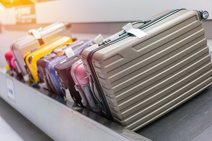 Professional Baggage Handler Warns Travelers To Avoid Putting Ribbons On Their Suitcases