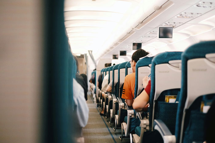 Drama Ensues After Man Refuses To Let Other Passengers On A Plane Pass By In The Aisle