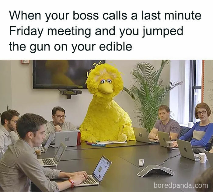 Boss calls last minute Friday meeting, employees are sitting in the meeting room.