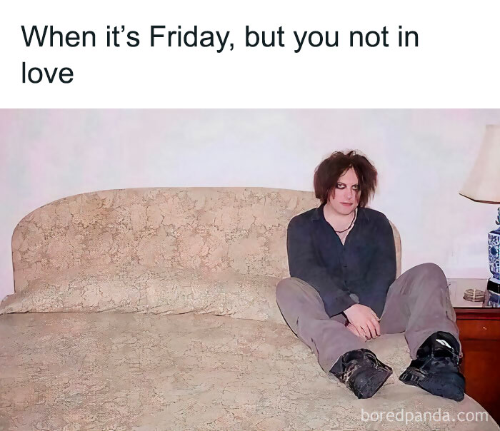 A man sitting on a bed, captioned "When it's Friday, but you're not in love."