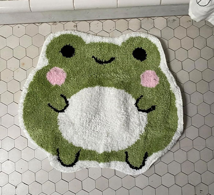 This Cute Bath Mat Makes Us Wonder What It Is Smiling About So Much...