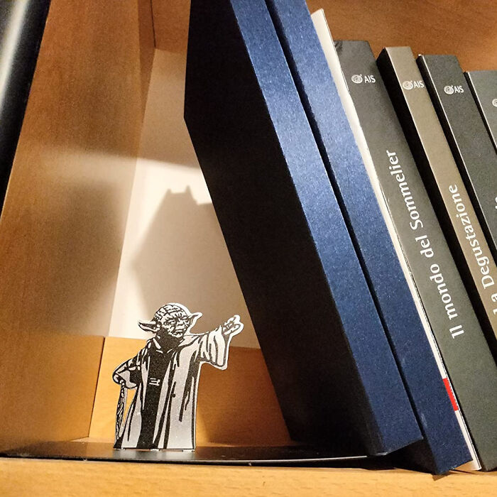 This Yoda Bookend Uses The Force To Keep Your Bookshelf Organized (No Jedi Mind Tricks Required)