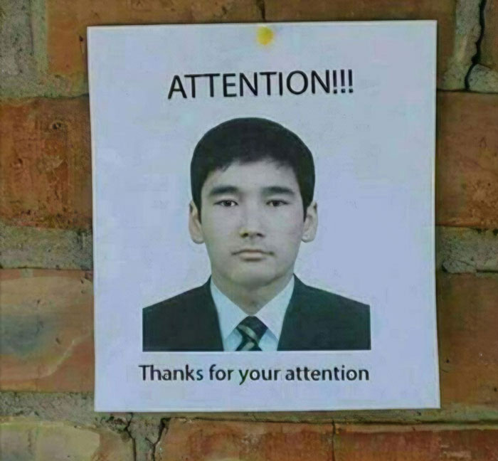 Poster of a man in a suit and tie with the text 'ATTENTION!!!' at the top and 'Thanks for your attention' at the bottom, humorously creating a redundant message.