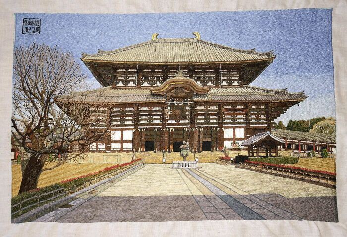 Creative embroidery of a Japanese temple showcasing detailed and intricate craftsmanship.