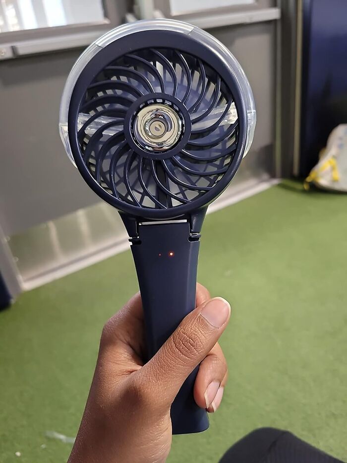  Handheld Misting Fan: Your Personal Cooling Cloud For On-The-Go Relief