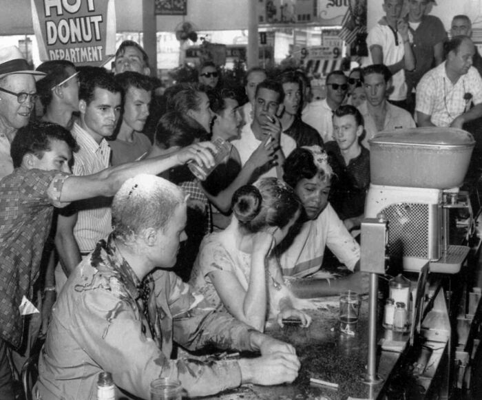 A Mob Pours Sugar, Ketchup And Mustard Over The Heads Of (From Left) John Salter, Joan Trumpauer And Anne Moody During A Sit-In Demonstration At A Woolworth’s ‘Whites Only’ Lunch Counter In Jackson, Miss. - May 28, 1963. (Photo By Fred Blackwell/Associated Press)