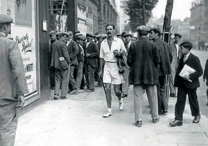 [1200x803] An Enthusiast For Men's Dress Reform Walking Down The Strand In London. The Mdrp (Men’s Dress Reform Party) Was Formed In The Interwar Years In Britain, 1930