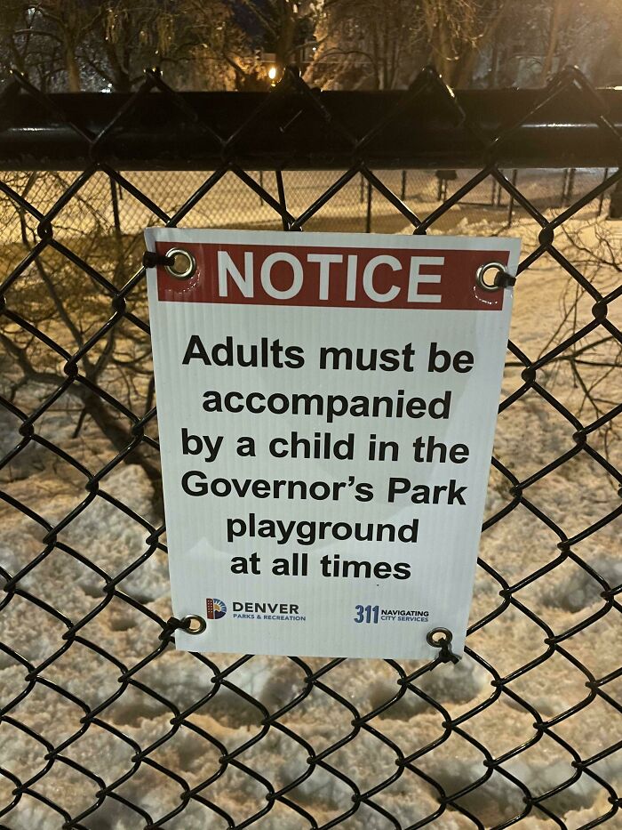 A Sign That Forbids Adults Who Are Not Accompanied By A Child In A Public Park