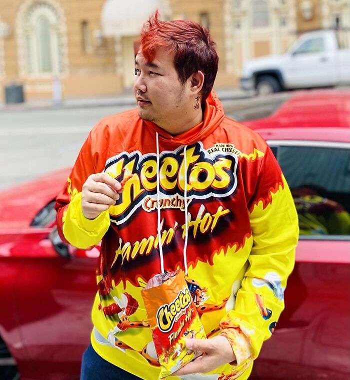 A Cheetos Hoodie Is The Cheesy Comfort You Crave, Whether You're Binge-Watching Your Favorite Show Or Just Feeling A Little Snacky