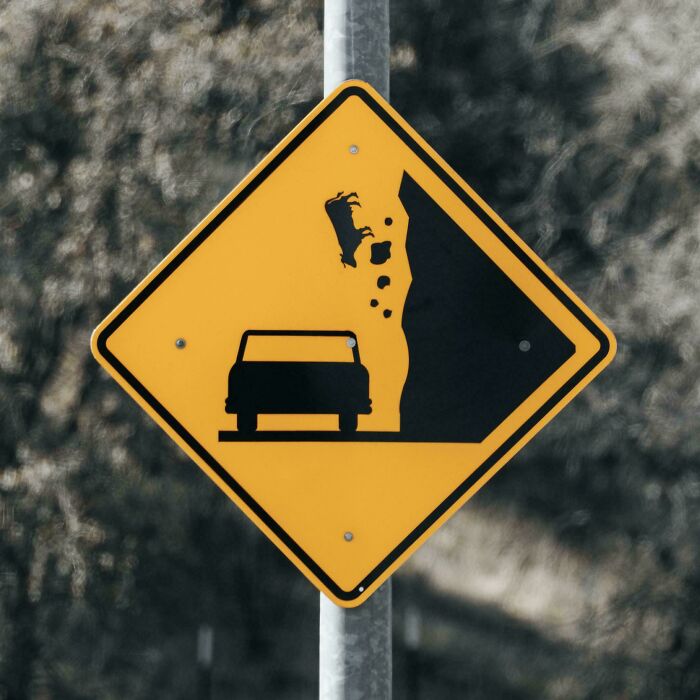 A Sign Warning Of Falling Cattle