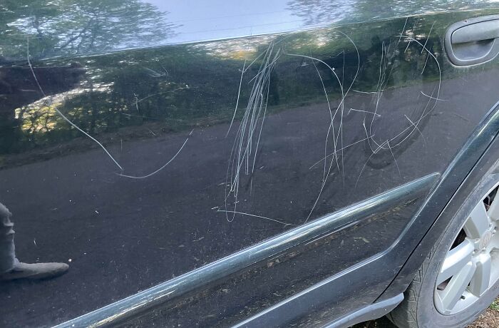 Neighbor's Kid Decided To Decorate My Car With A Rock To Make It Look "Cute"