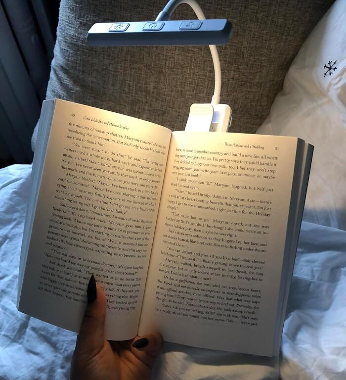 This LED Book Light Is The Bedtime Bestie Your Bookworm Heart Never Knew It Needed - No More Squinting Or Disturbing Your Partner With The Overhead Light!