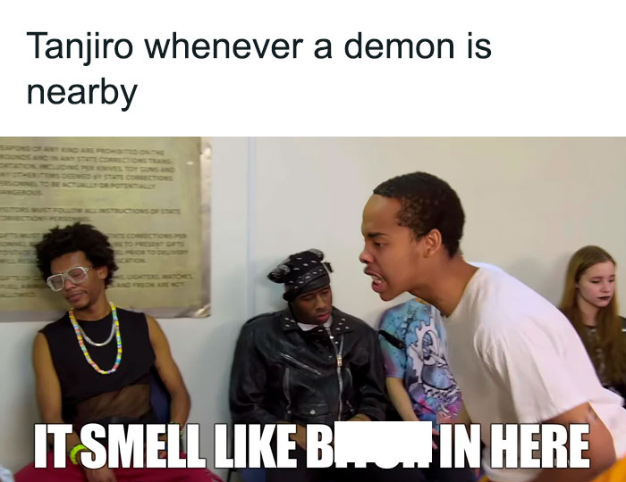 A Demon Slayer meme featuring a scene from a popular video with text at the top that reads, "Tanjiro whenever a demon is nearby." The bottom part shows a person in a room pointing and shouting, with the caption, "IT SMELL LIKE B***H IN HERE." This meme humorously suggests that Tanjiro, with his heightened sense of smell, can detect the presence of demons, paralleling the character in the video who claims to smell something suspicious.