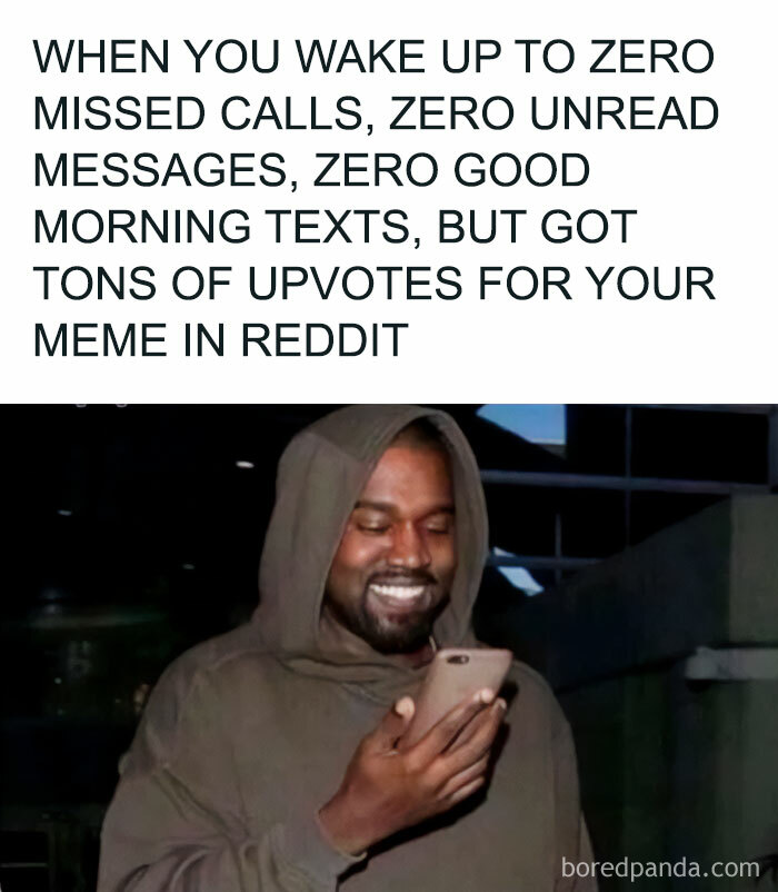 Man smiling at phone, celebrating Reddit upvotes, with "Good Morning" meme text above.