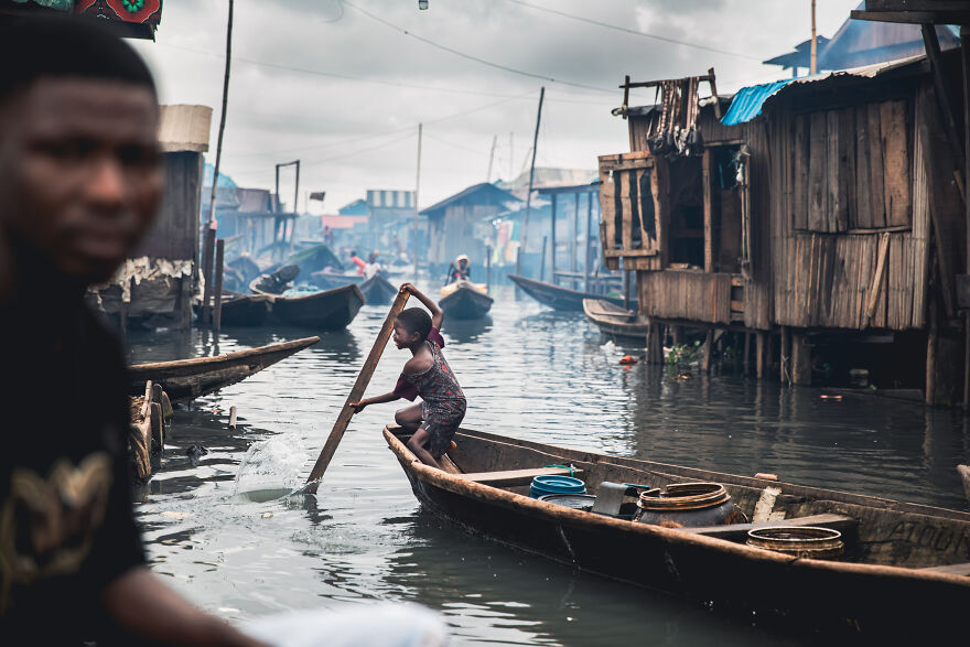 Girl Is Traveling To The School In Makoko Ghetto, Lagos, Nigeria