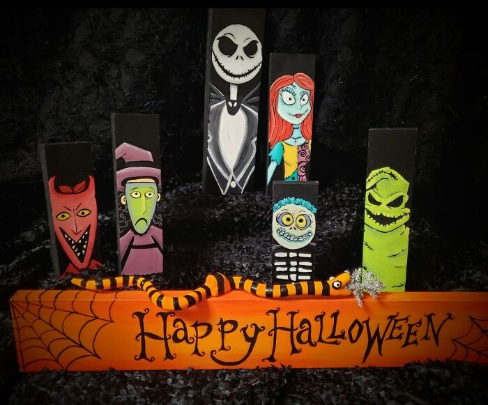 Nightmare Before Christmas Mantle And Shelf Decorations. Hand Painted On Wood Blocks. Clay Snake Eating Gifts And Christmas Tree. Sign Says Hapy Halloween On One Side, Merry Christmas On The Other