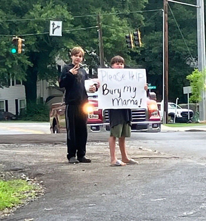 “Please Help Bury My Mama”: 11-Year-Old Boy Stands On Roadside For Two Days To Raise Money