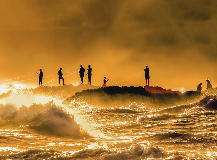 "Braves Fishermen In The Rough Sea" By Hernani Castro Jr