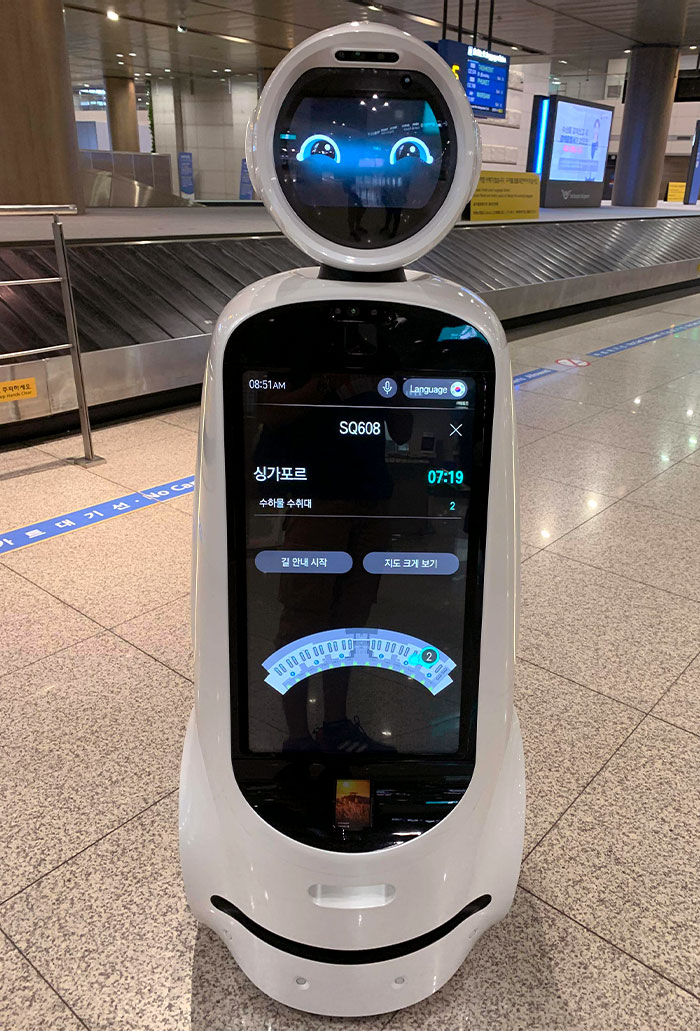 These Helpful Robots That Wander Incheon Airport, Seoul, That You Can Use To Check Flight Information