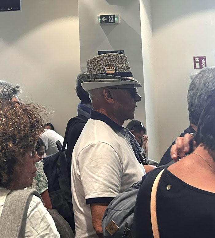 This Man At The Airport Was Wearing 3 Fedoras