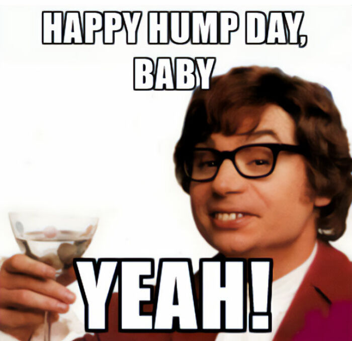 A picture of Austin Powers, a character played by Mike Myers, holding a martini glass and smiling. The text at the top reads, "HAPPY HUMP DAY, BABY," and at the bottom reads, "YEAH!"