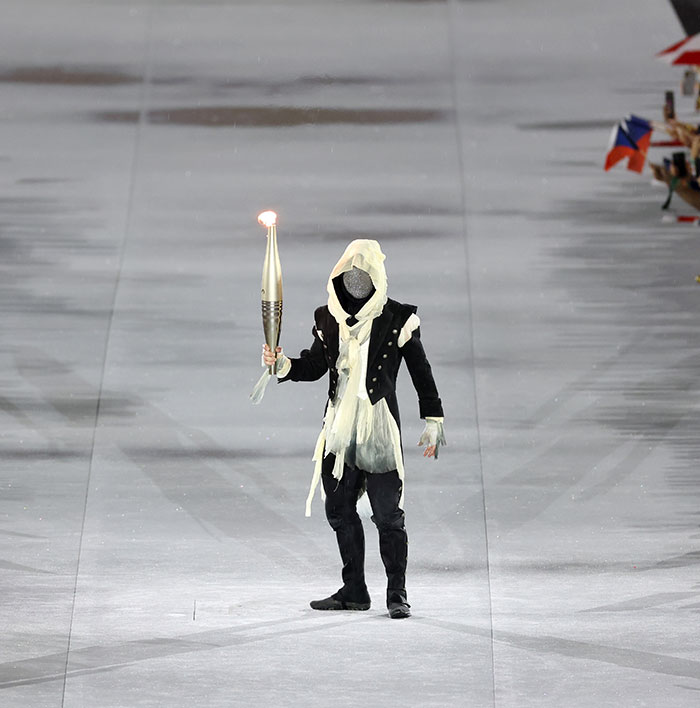 "Assassin's Creed character?":Mysterious Olympic Torchbearer Accidentally Reveals His Identity