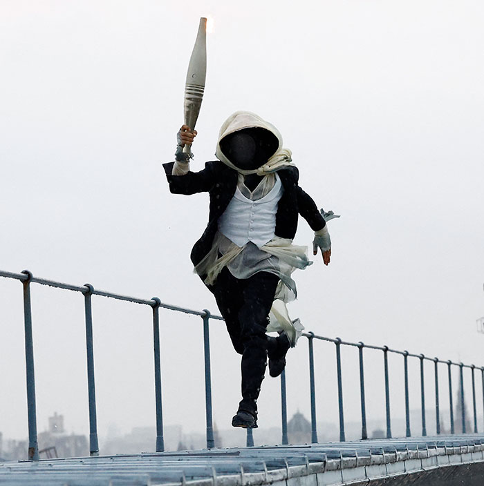 "Assassin's Creed character?":Mysterious Olympic Torchbearer Accidentally Reveals His Identity