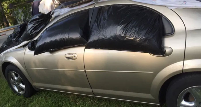 No Carport No Problem Filled Garbage Bags With Leaves And Rolled Them Up In The Windows To Keep Them In Place