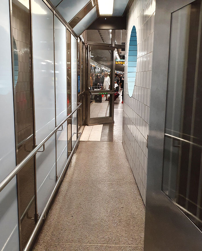 This Narrow Passageway Leads To The Only Elevator On The Platform