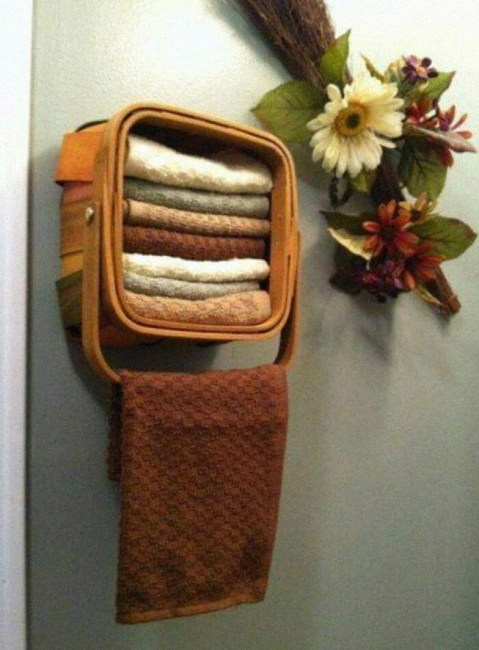 A Basket That's Being Reused As A Hand Towel Shelf. It's Cheap, Simple, Charming, And Practical