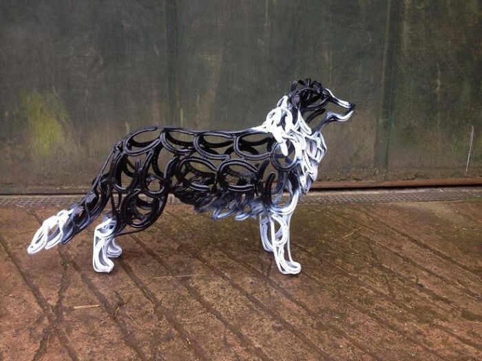 A Border Collie Made From Horse Shoes