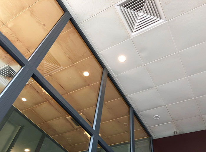 The Ceiling Tiles In The Da Nang Airport Smoking Section vs. Non-Smoking Section