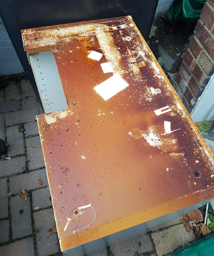 Some Objects Left Imprints On The Tops Of Kitchen Units From A Smoker's House