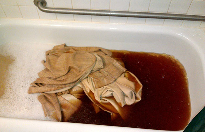 Curtains From A Smoker's Apartment After Being Dunked In A Bathtub