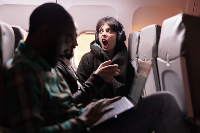 Stinky Guy Keeps Leaning On Woman During Flight, She Just About Starts Screaming At Him