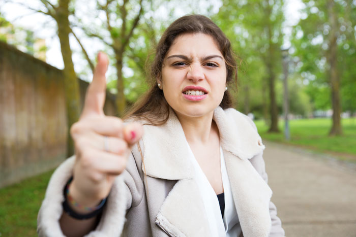 BF Terrified After GF Aggressively Grabs His Face And Snarls At Him In Front Of Their Friends 