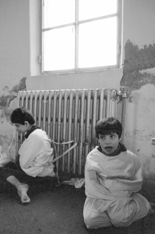 Child Patients Sit Bound And Tied To A Radiator Inside The Psychiatric Hospital In Deir El Qamar, Lebanon In 1982